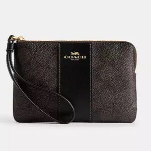 Coach corner zip wristlet mahogany with black Stripe nwt